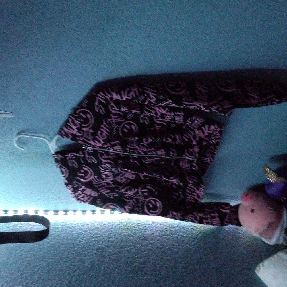 I'm selling a zip up jacket from orange kiss, size is medium